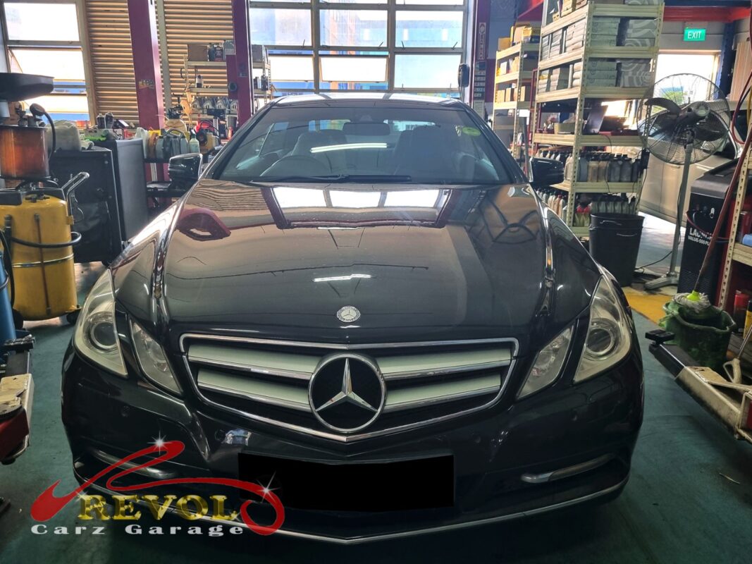 Mercedes-Benz E250 parked at the workshop, in for a scheduled transmission service.