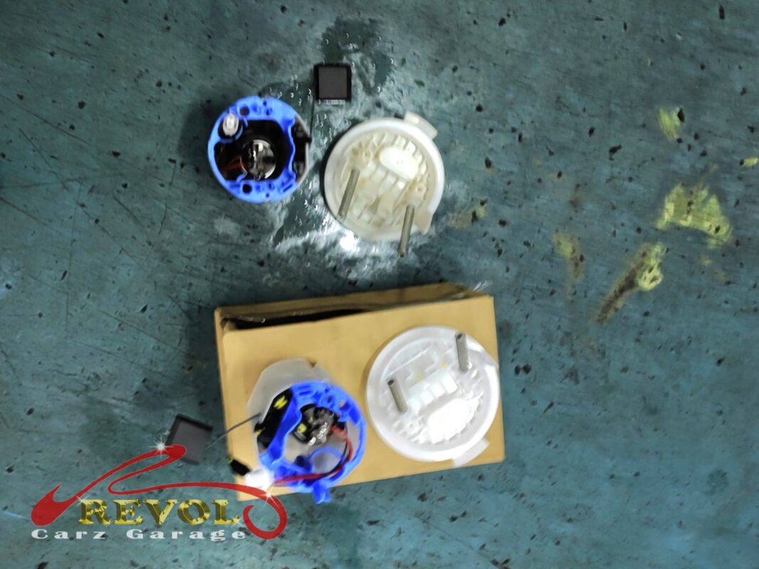 The old in-tank fuel pump assembly removed.