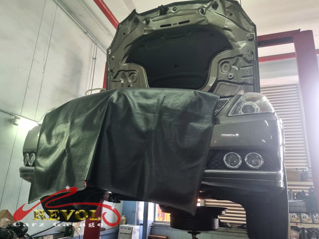 The E200 up on the two-post lift, in for the front suspension.