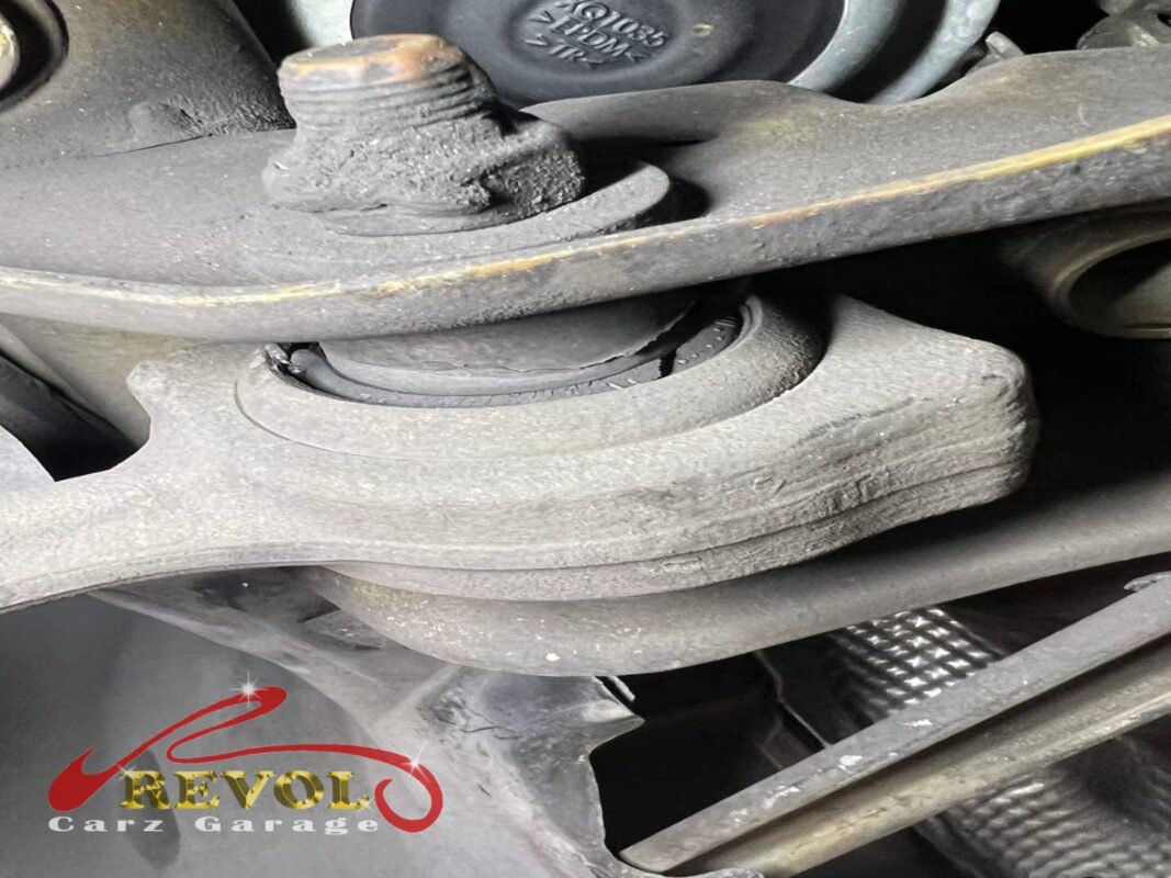 Front control arms on the car, the bushing rubber cracked, the slack behind the clunk.