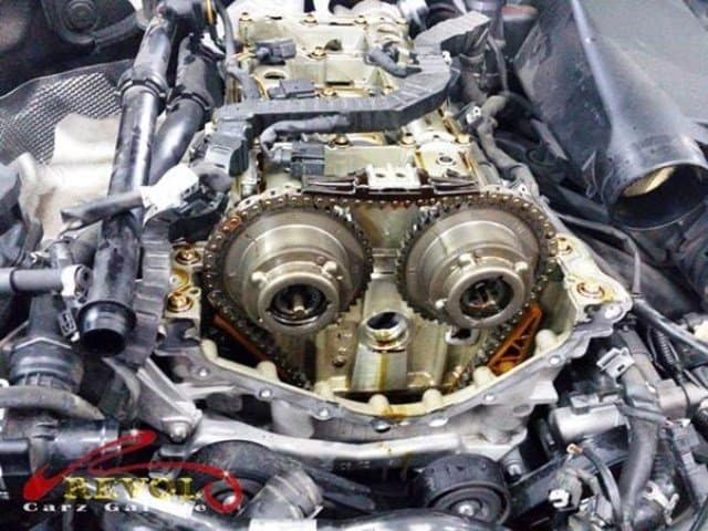 The engine opened up to the timing area to reach the worn sprockets.
