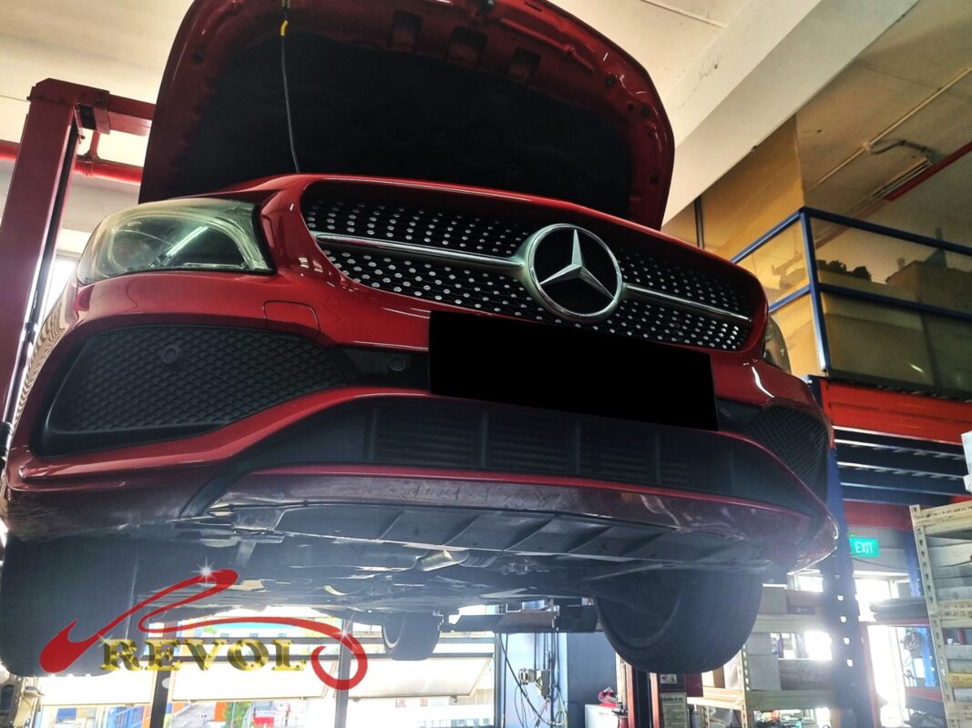 The CLA180 up on the two-post lift for its ATF service.
