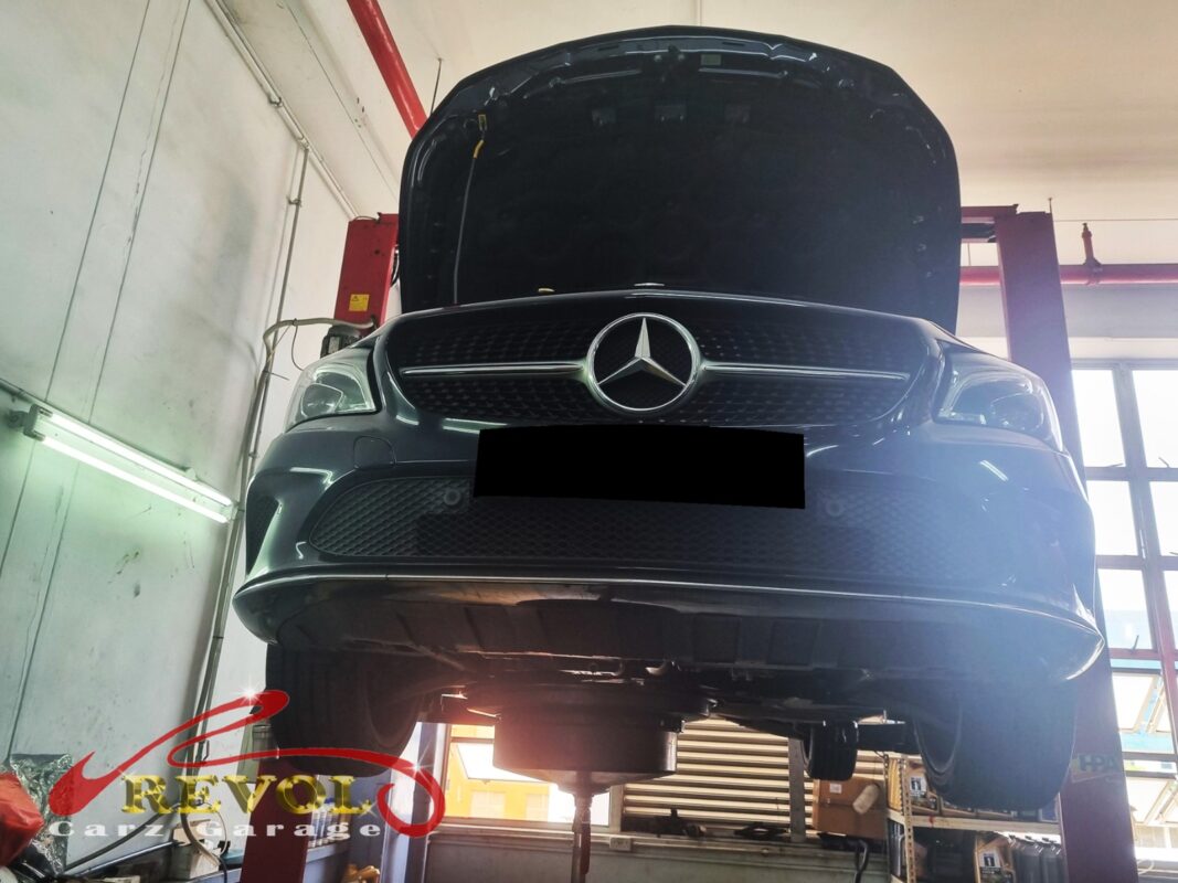 The CLA180 up on the two-post lift for its scheduled service.