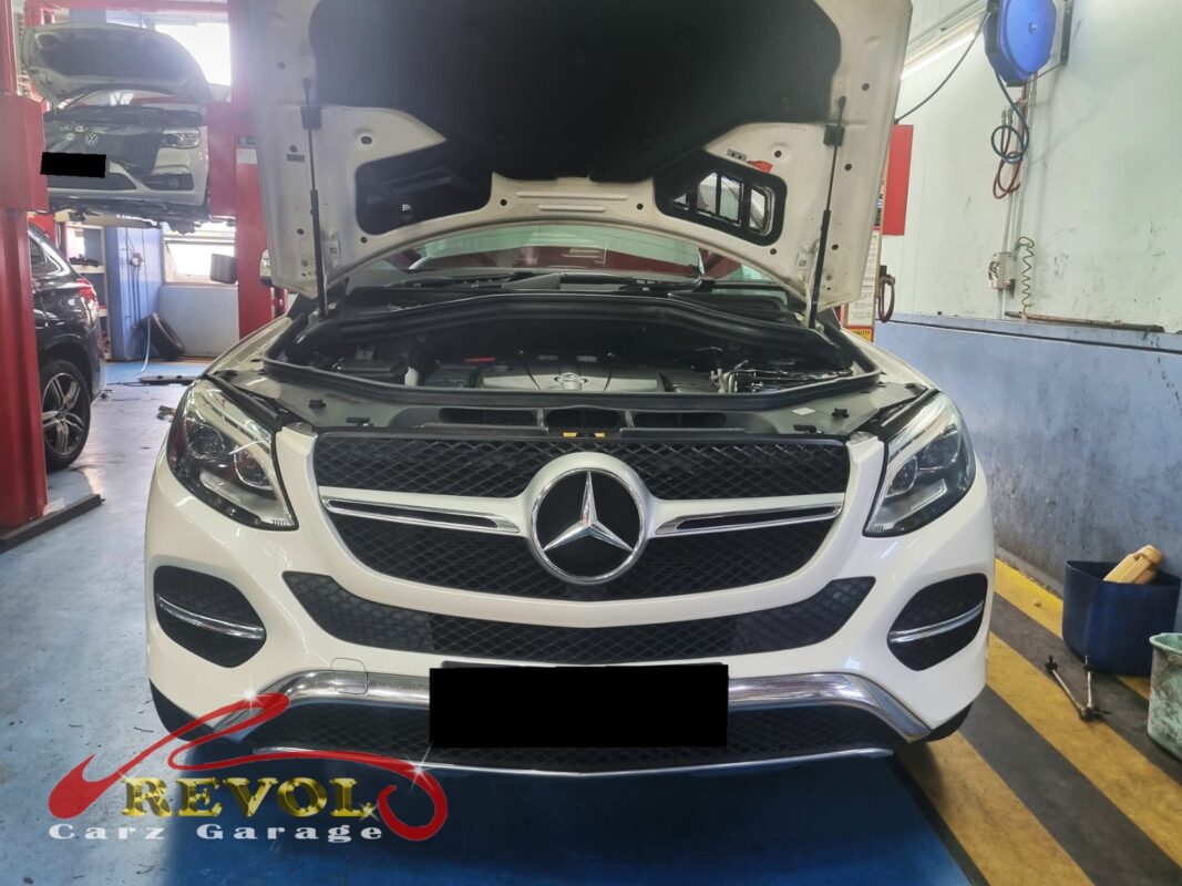 Mercedes-Benz GLE400 on the workshop lift for radiator replacement.