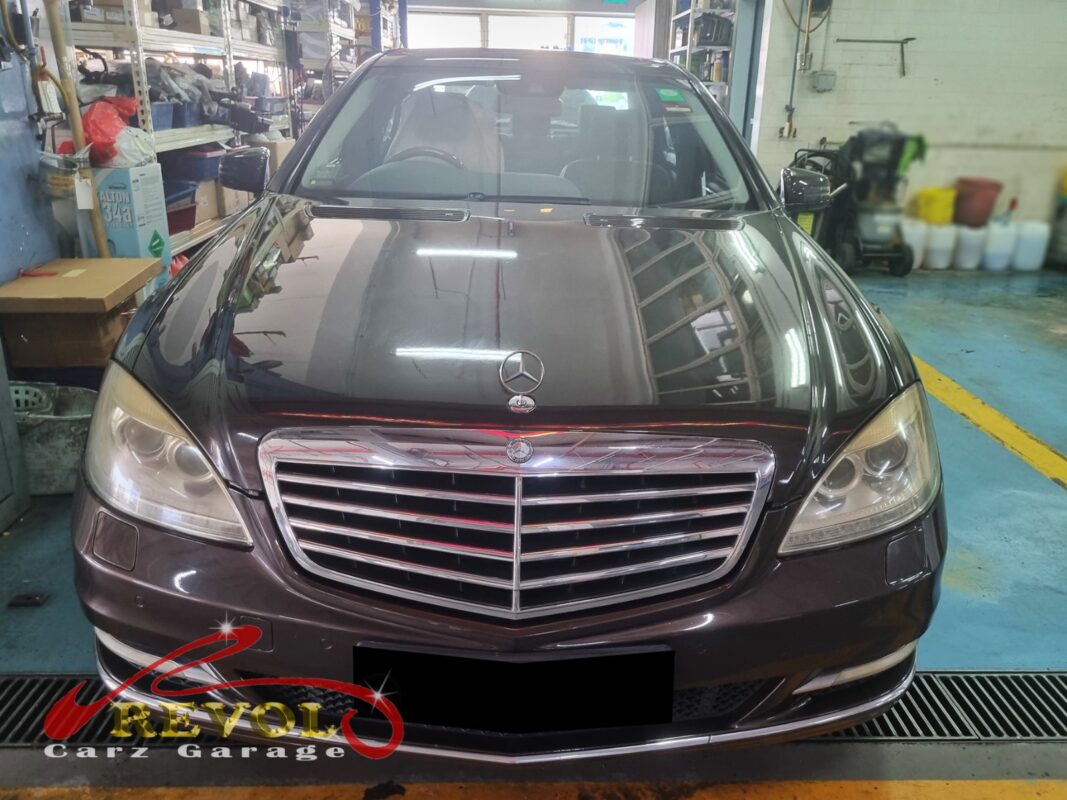 Mercedes-Benz on the workshop lift with the front wheel off for tie rod end replacement.
