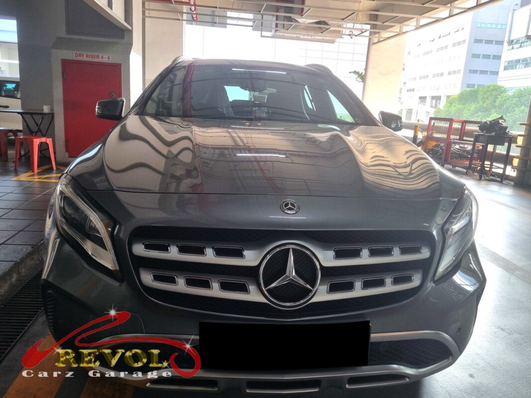 Mercedes-Benz GLA180 on the workshop lift for cooling tank and hose replacement.