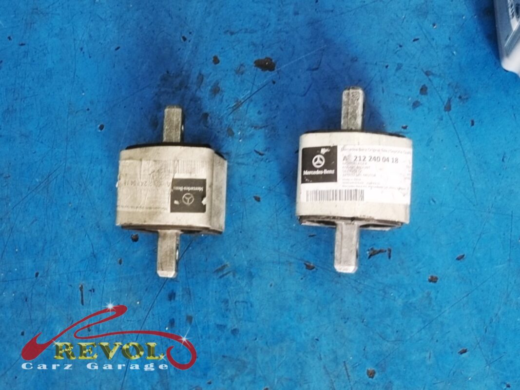 Old and new engine mounts side by side, replaced on the same visit.
