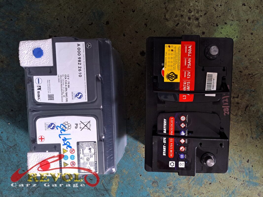 The new Mercedes-spec AGM battery (left) beside the old one removed (right).