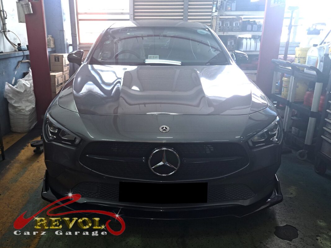 Mercedes-Benz CLA180 with the engine bay open for thermostat housing replacement.