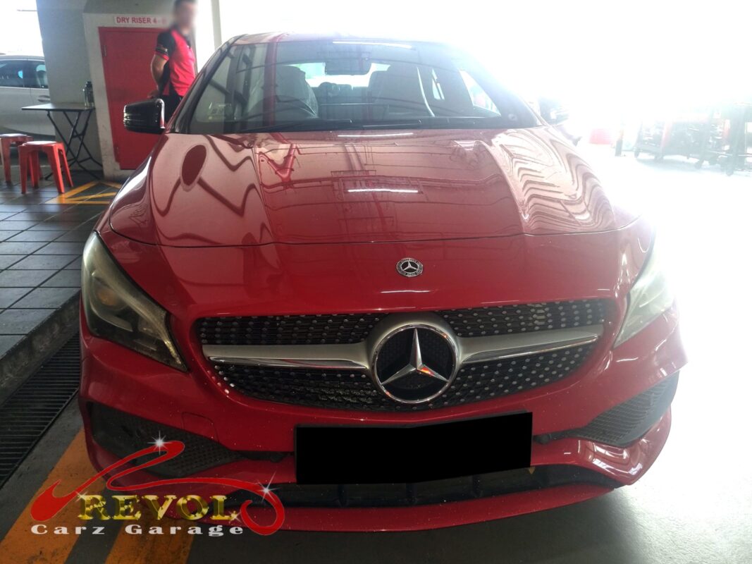 Mercedes-Benz CLA180 with the engine bay open for alternator replacement.