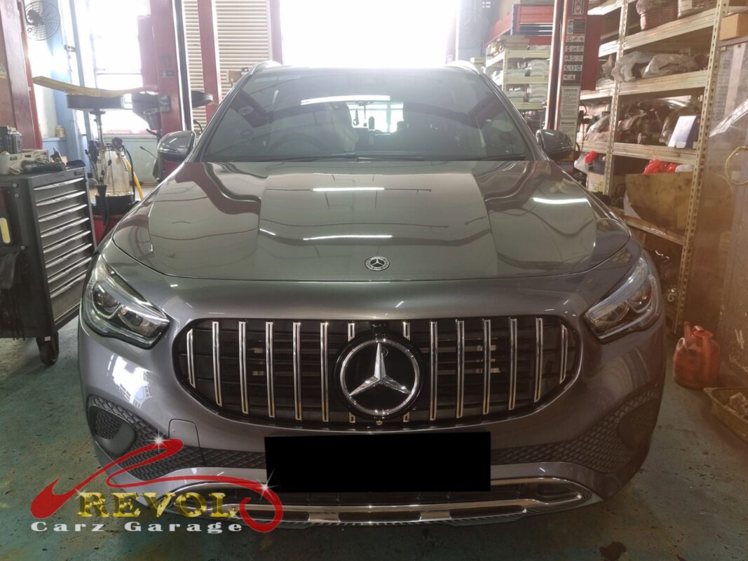 Mercedes-Benz GLA200 with the engine bay open for thermostat housing replacement.