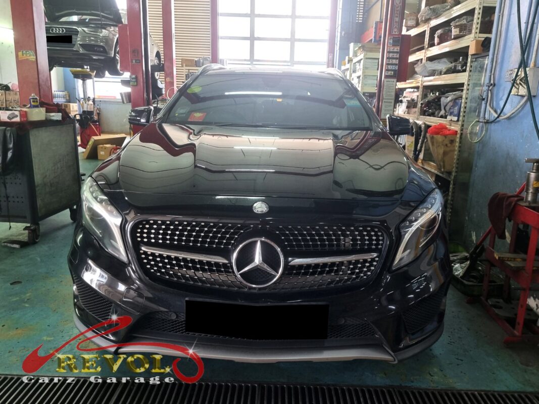 Mercedes-Benz GLA200 with the cam cover off for camshaft inspection.