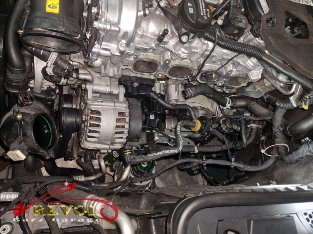 The old coolant pipe (top) beside the new Mercedes-spec replacement (bottom).