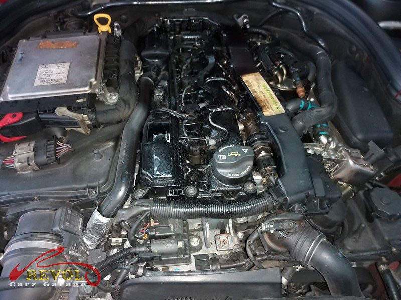 The pressure test on the Mercedes-Benz C220 cooling system finding the weeping thermostat housing.