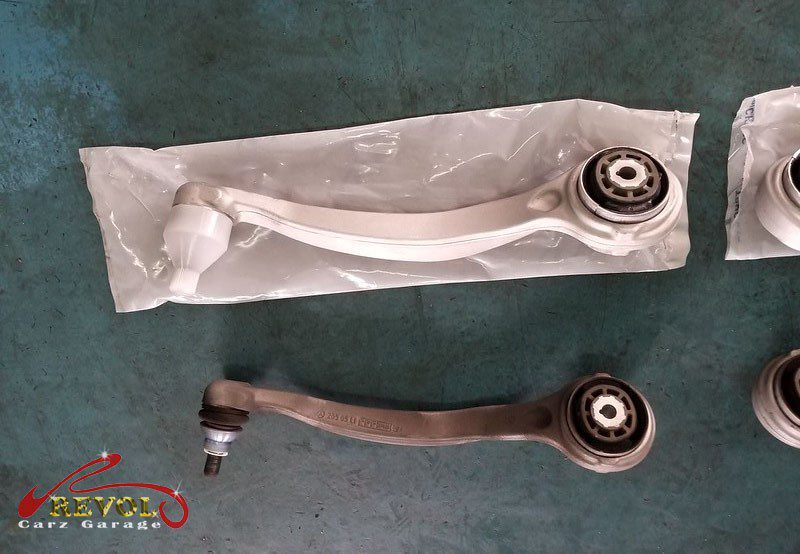 The new genuine Mercedes-spec front control arms ready to fit.