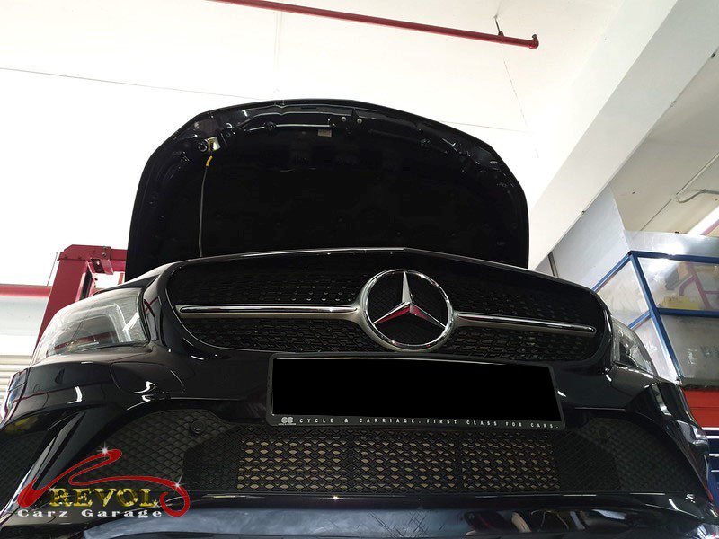 Mercedes-Benz parked at the workshop, in for engine mount inspection.