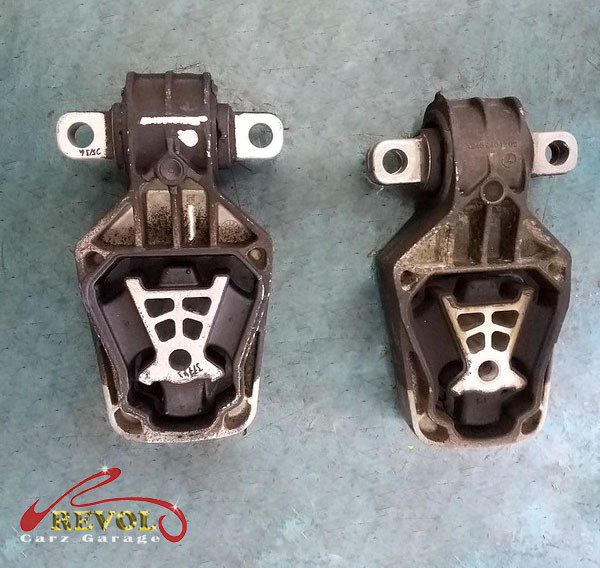 The gearbox mount removed showing the play under load.