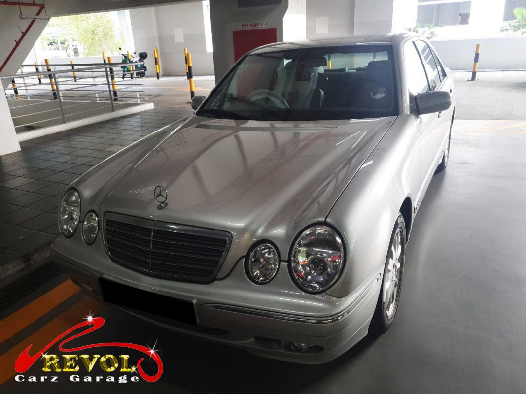 Mercedes-Benz E200 W210 parked at the workshop for a safety check and service.