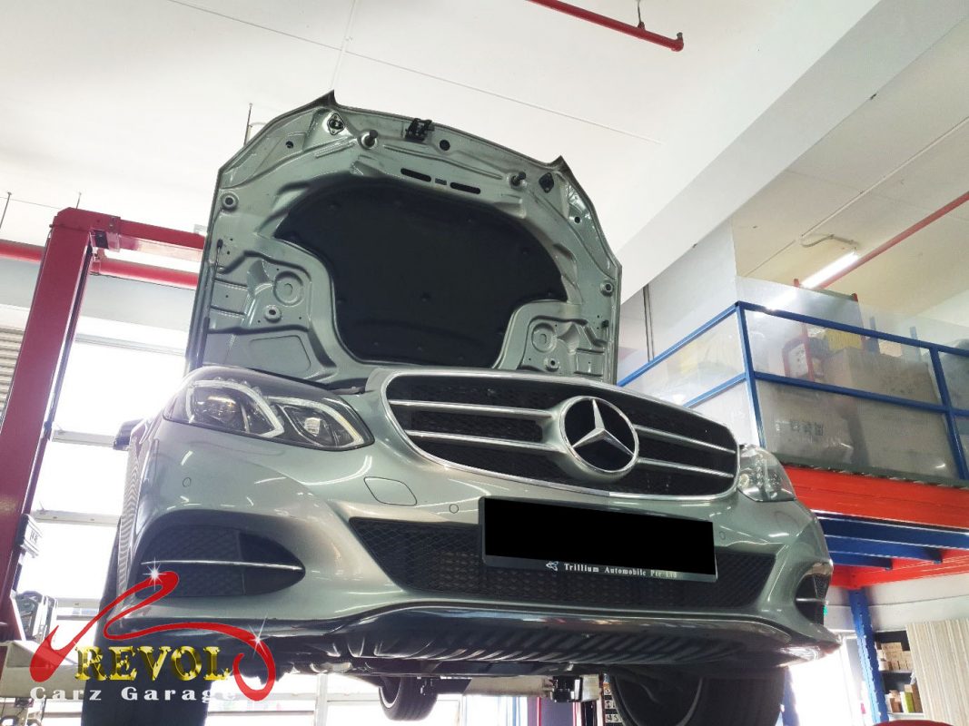 Mercedes-Benz E200 parked at the workshop, in for suspension and battery work.