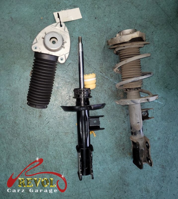 The new genuine Mercedes-spec front struts and top mounts ready to fit.