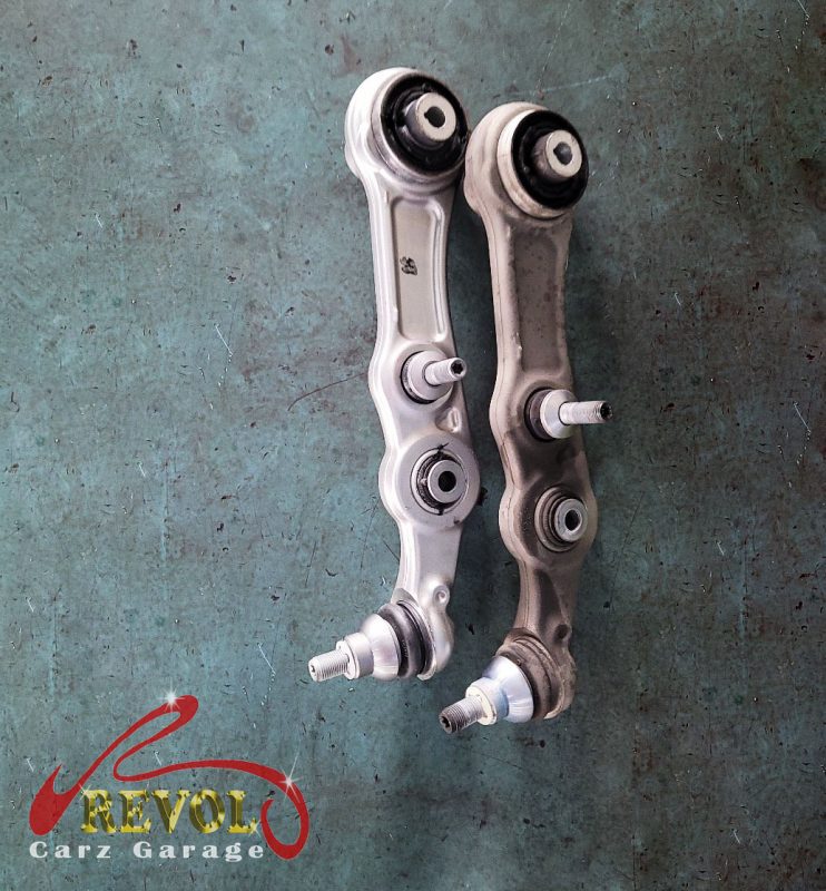 The new genuine Mercedes-spec front lower control arms ready to fit.