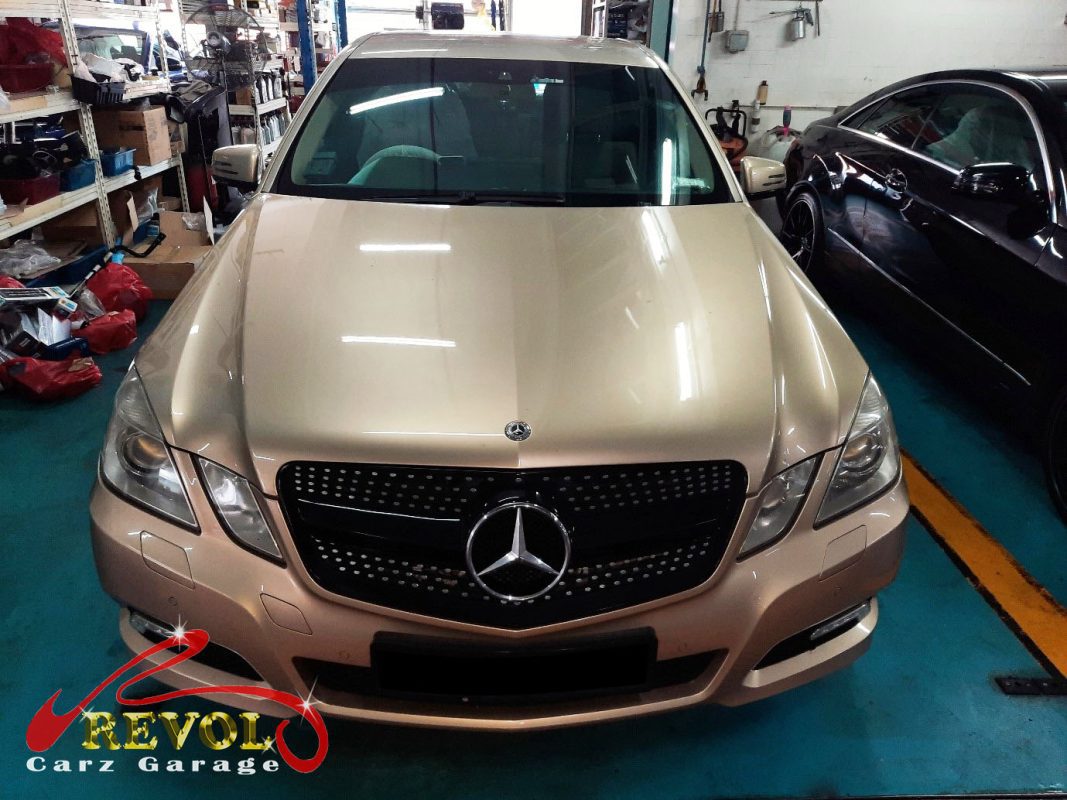 Mercedes-Benz E250 parked at the workshop, in for a transmission fluid leak diagnosis.