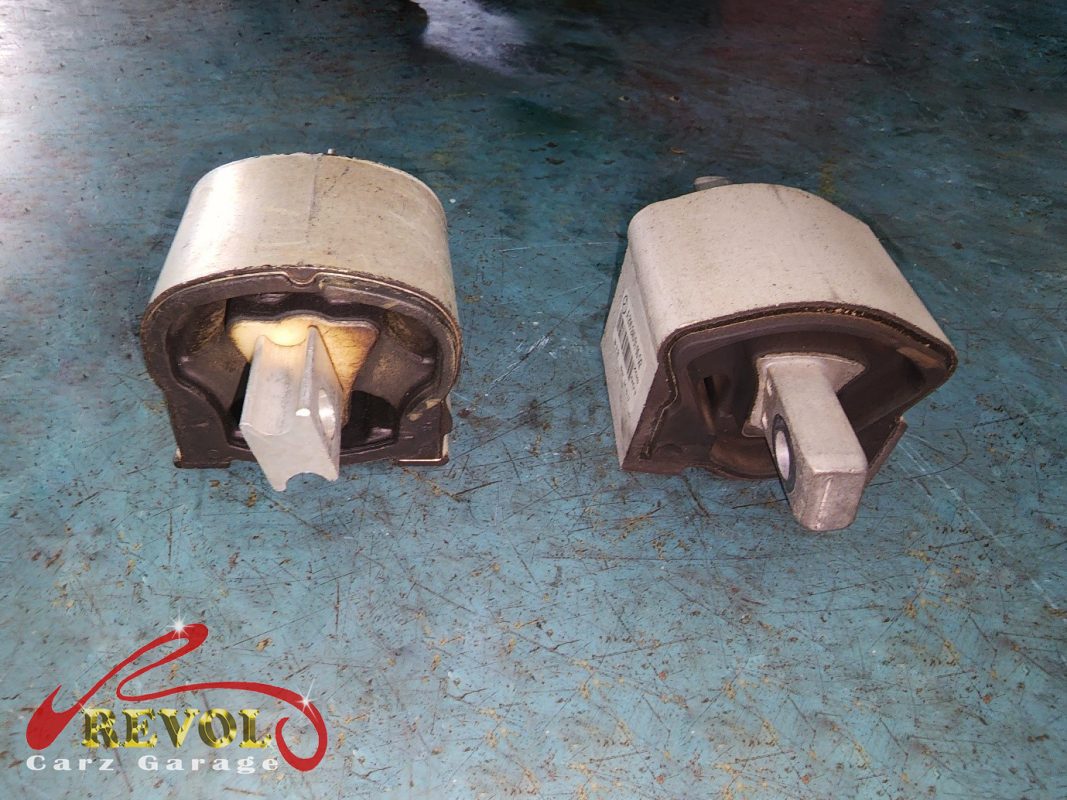 The gearbox mount removed showing the play under load.