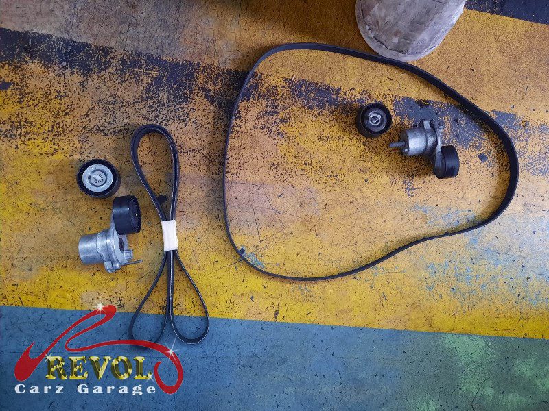 The water pump module removed showing the early bearing wear.