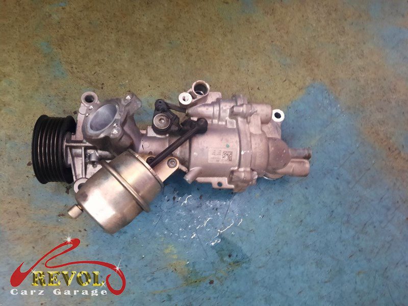 The new genuine Mercedes-spec belt, tensioner, idlers and water pump ready to fit.