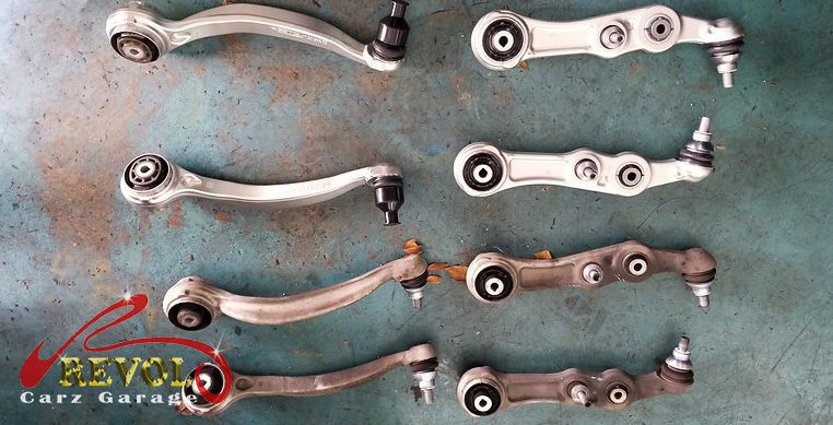 The new genuine Mercedes-spec lower control arm ready to fit.