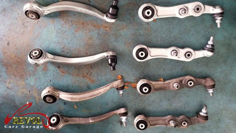 The new genuine Mercedes-spec front lower control arms ready to fit.