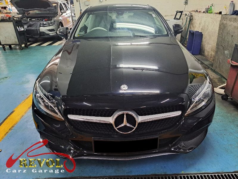 Mercedes-Benz C180 parked at the workshop for maintenance servicing.
