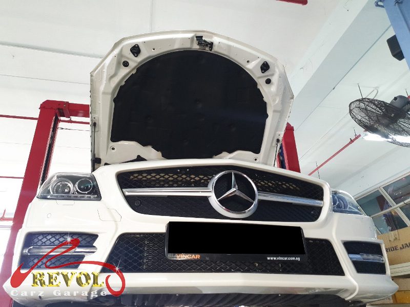 The front suspension safety inspection on the Mercedes-Benz SLK350, the creaking traced to the anti-roll bar links.
