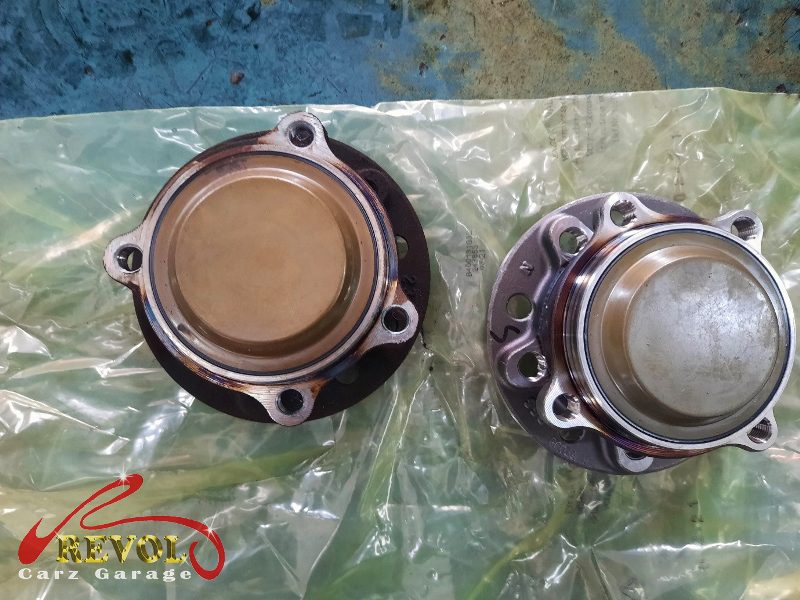 The old worn front wheel bearings removed from the hubs.