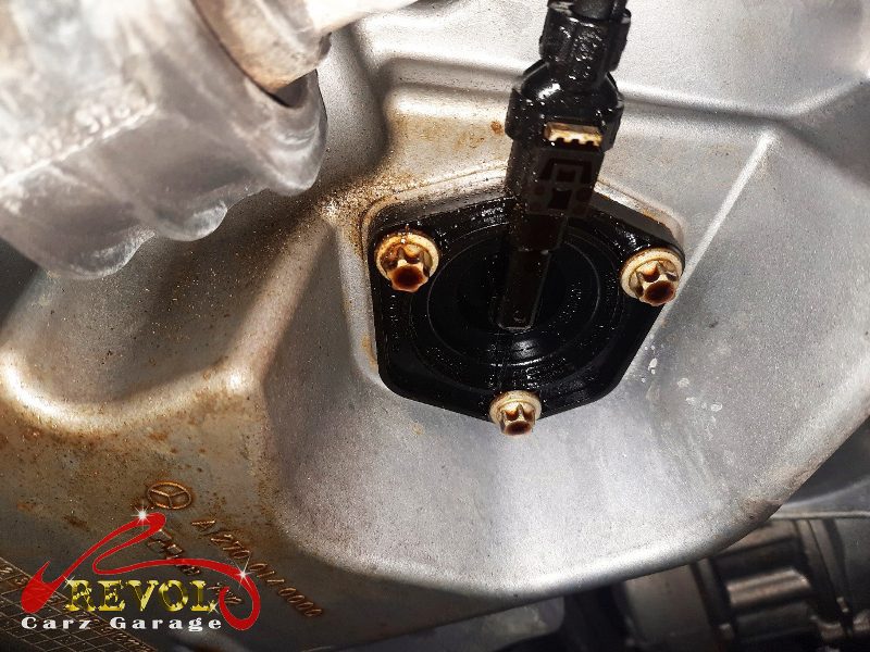 The old oil level sensor removed from the sump.