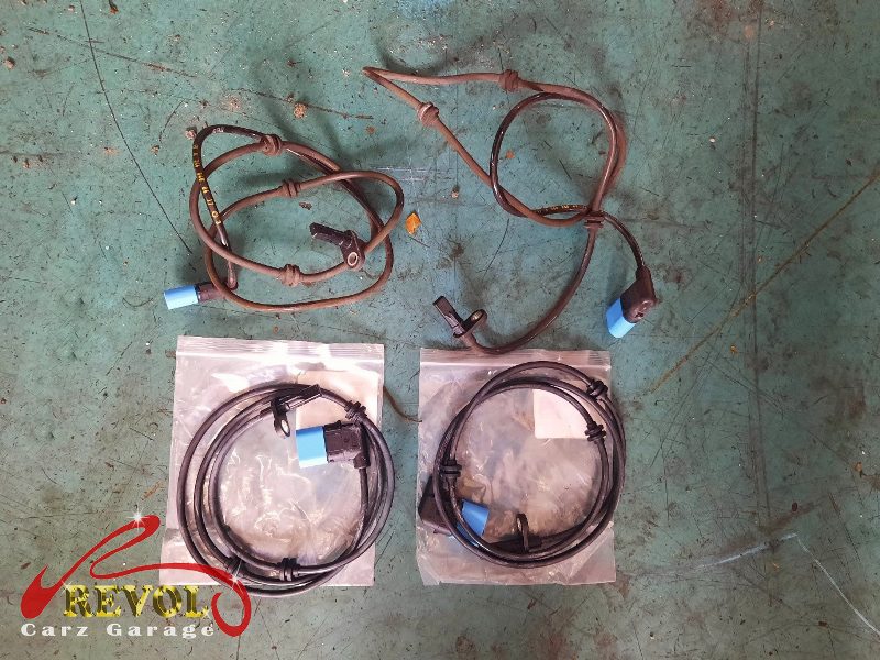 The old ABS sensor removed from the hub.