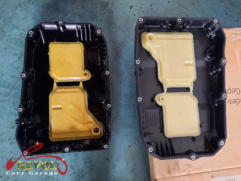 The new genuine Mercedes pan-and-filter assembly ready to fit.
