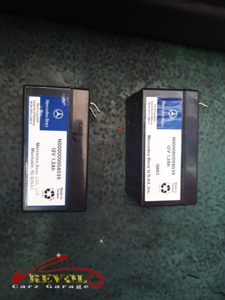 The new genuine Mercedes battery being fitted and registered to the car.