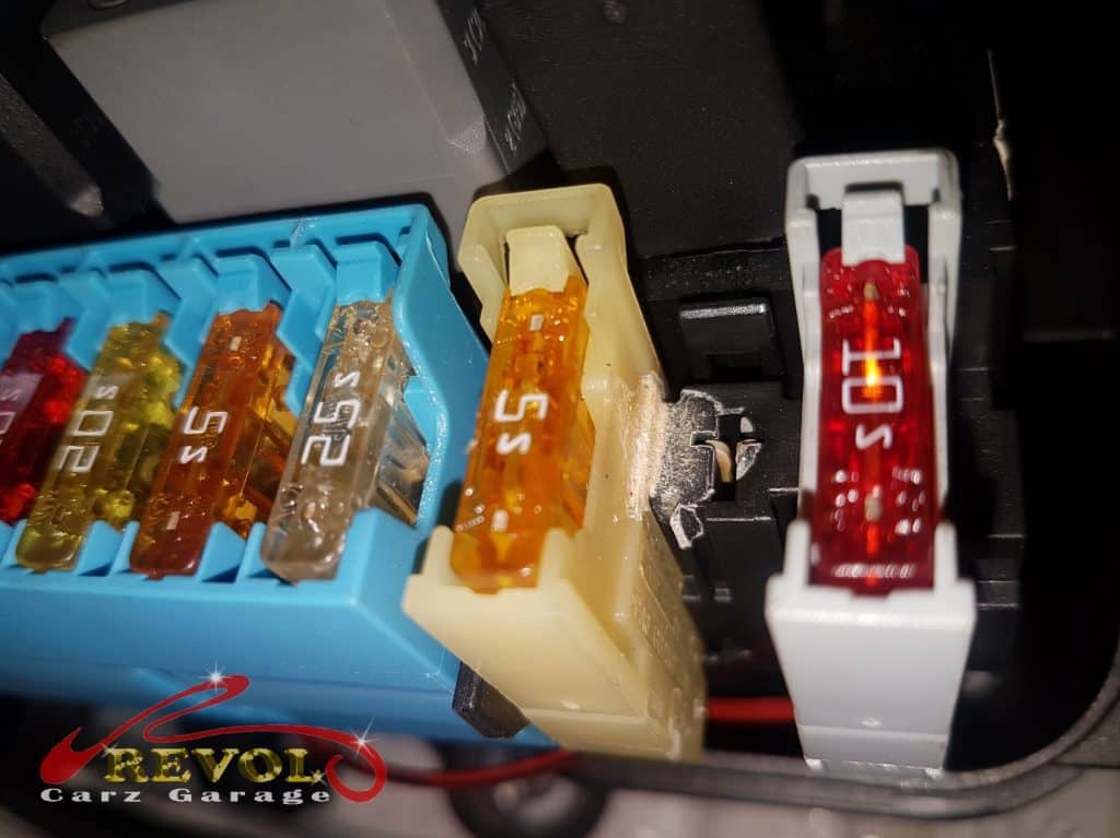 The worn fuse box identified as the cause of the no-start.