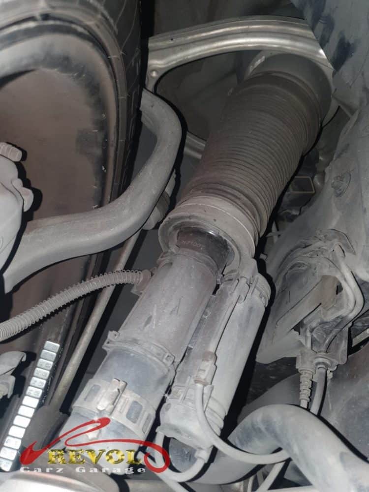 The badly worn spark plugs removed from the engine.