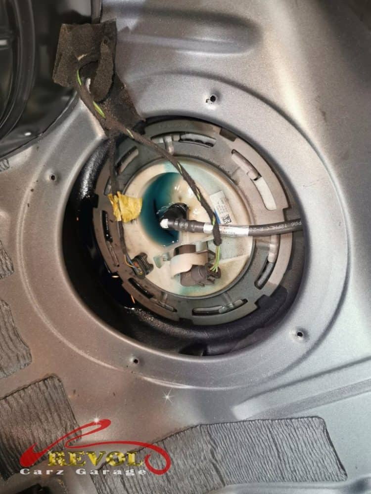 The rear seat lifted on the Mercedes-Benz E250 to reach the in-tank fuel pump.