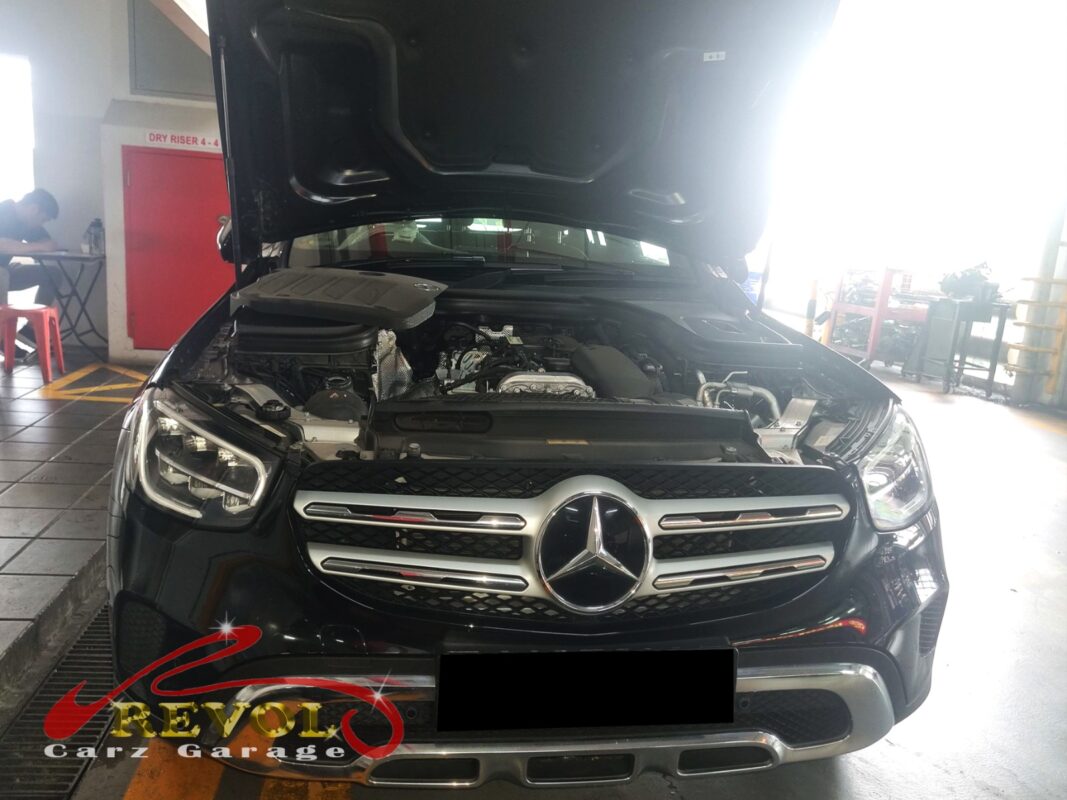 Mercedes-Benz GLC200 on the workshop lift for coolant leak diagnosis.