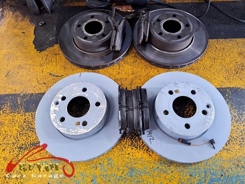 The new genuine Mercedes-spec front discs and pads ready to fit.