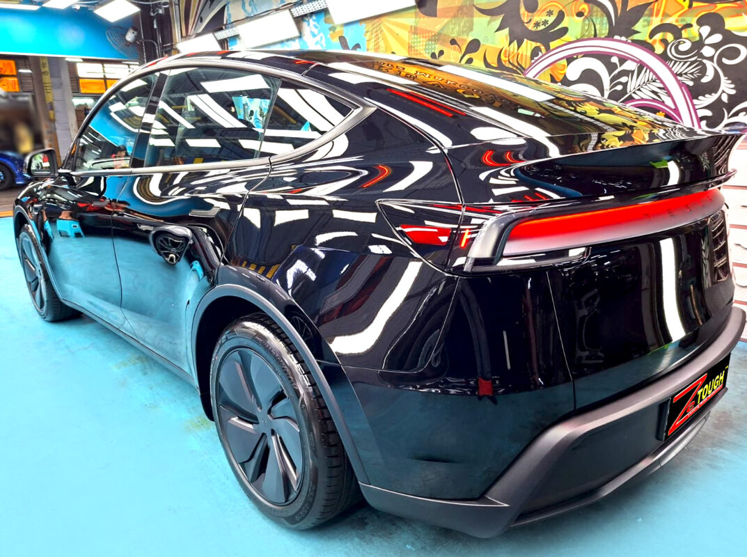 The coating bonded and curing across the car.