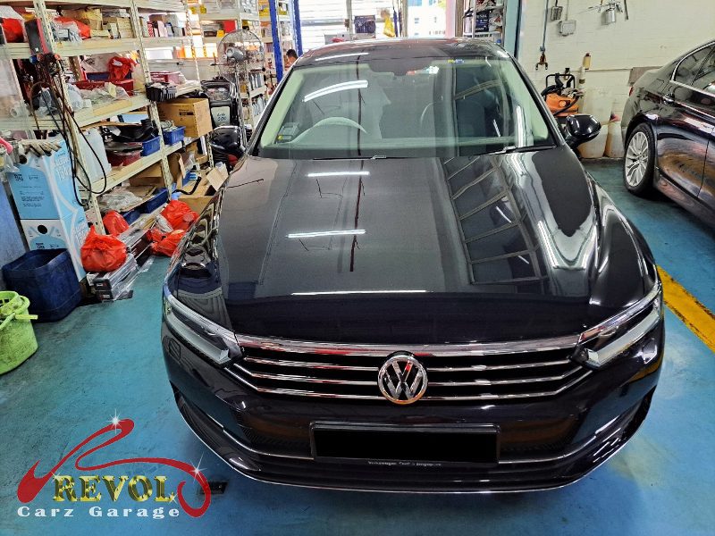 Volkswagen Passat parked at the workshop, in for an oil leak diagnosis.