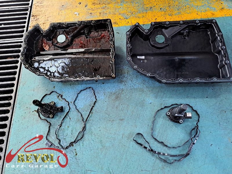The new genuine VW oil level sensor and a fresh sump seal ready to fit.
