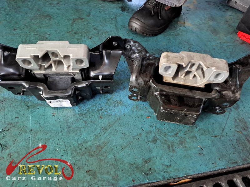 The new mounts installed, the drivetrain settled and aligned in the bay.