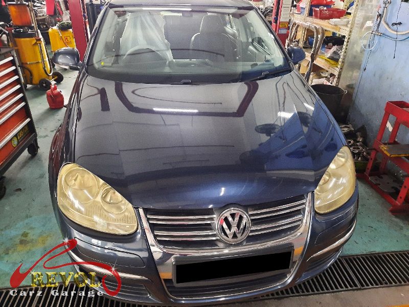 Volkswagen Jetta parked at the workshop for regular servicing.