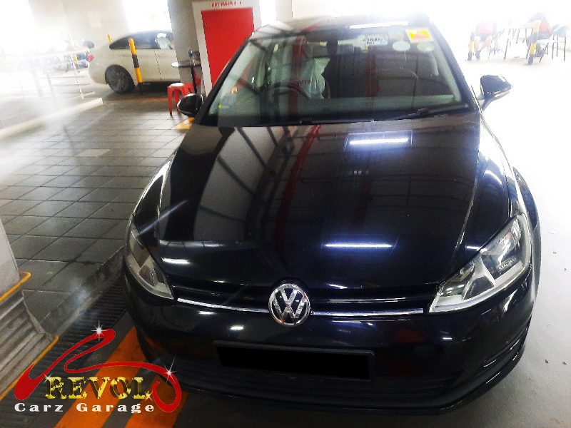 Volkswagen Golf parked at the workshop, in for mount and shock absorber replacement.