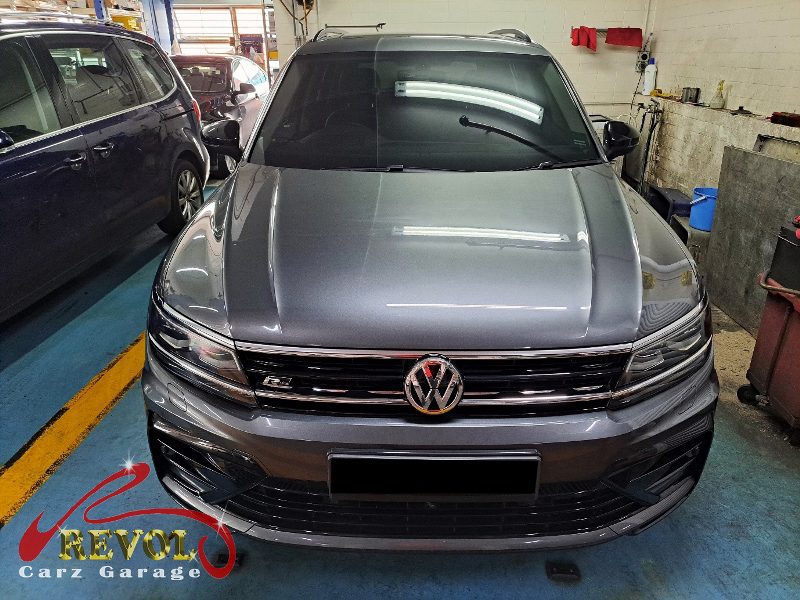 Volkswagen Tiguan parked at the workshop, in for brake and battery replacement.
